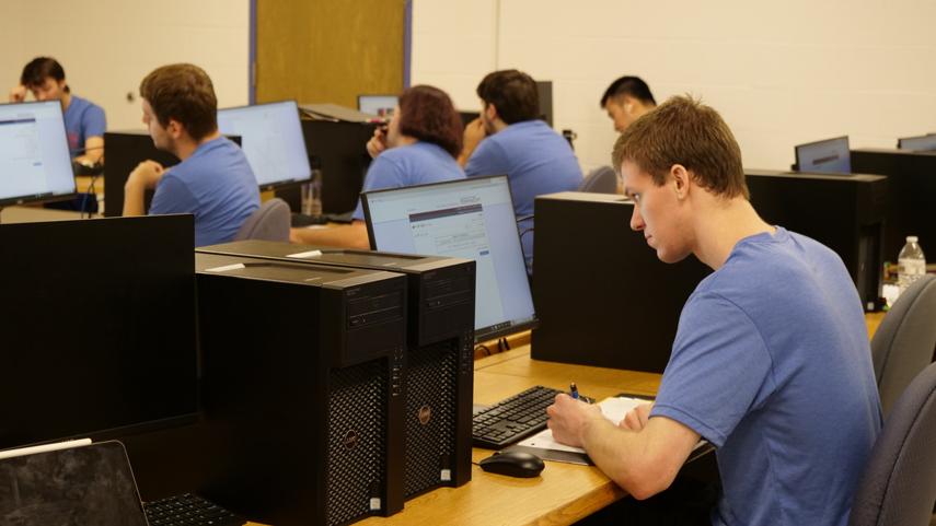 student working at computer in computer lab